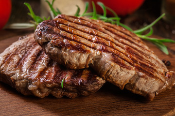 Wall Mural - Succulent portions of grilled fillet mignon served with rosemary