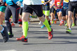 © Iuliia Sokolovska - Marathon running race, many runners feet on road, sport, fitness and healthy lifestyle concept