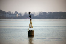A Navigation Buoy In The Sea