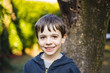 © Emanuele Capoferri - portrait of 7 year old boy outdoor in the garden in winter