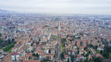 Fototapeta Miasto - Aerial video shooting with drone on Bergamo, famous and ancient Lombardia city, founded on the hills