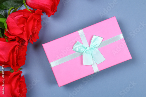 pink roses with a gift box tied with a bow template for march 8