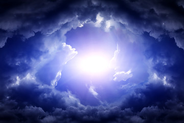 Wall Mural - cloudscape with a light