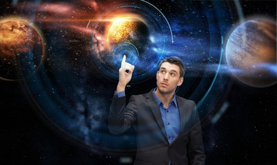 Wall Mural - businessman with virtual planets and space