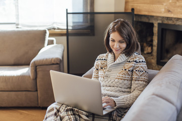 Woman Working on Laptop on Wintertime