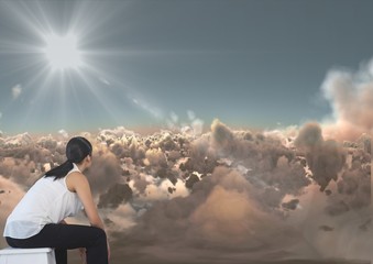 Poster - Business woman looking across clouds at something