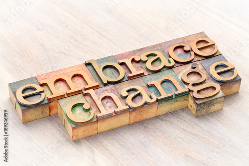 Fotomural embrace change word abstract in wood type