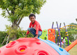 © weedezign - black americans kid boy having fun to play on children's climbing toy at school playground,back to school outdoor activity