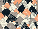 Seamless pattern with mountains in scandinavian style. Decorative background with landscape. Hand drawn ornaments.