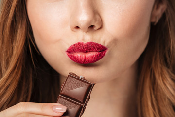 Poster - Close up portrait of a seductive brown haired woman