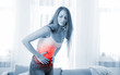 © leszekglasner - Young woman at home suffering from abdominal pain