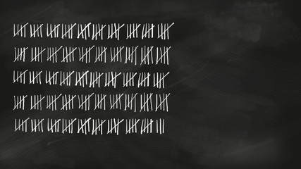 Five series tally sheet chalk lettering with 248 lines jotted on a black vintage chalkboard; wide copy space with no people