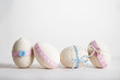 Easter background with Easter eggs, pastel colours decoration on the white background