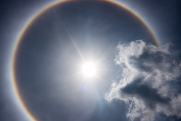 Wall Mural - fantastic beautiful sun halo phenomenon. serenity nature.