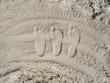 Fußabdruck Familie im Sand am Strand