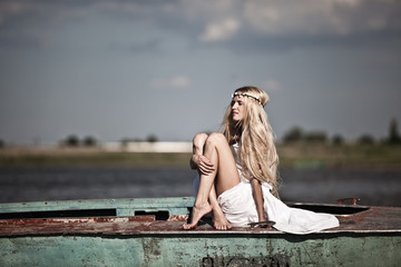 a young innocent girl at the lake