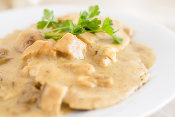  Veal escalope with creamy sauce and mushrooms.Iitalian foodsteak