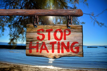 Wall Mural - Stop hating motivational phrase sign