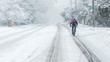 man Riding bike in the snow
