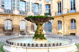 Famous ancient historic old fountain in aix en provence France photo