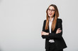 © Drobot Dean - Portrait of a happy businesswoman dressed in suit