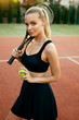 Sports Fashion. Beautiful Woman On Tennis Court.