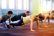© Syda Productions - group of people exercising in gym