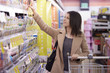 © Stocked House Studio - woman doing shopping at supermarket