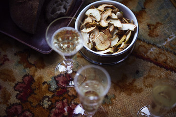 Lunch Provencal style, seasonal vegetables, fruits, champagne in glasses, daylight