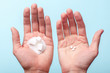 Choice of Sweetener in tablets or regular sugar. Alternative to sugar for diabetics. A man holds sugar in one hand in another sugar sauce in tablets.