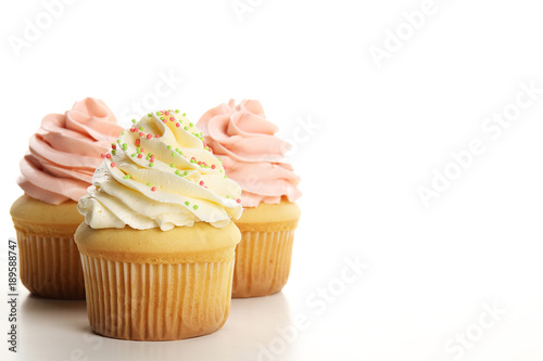 Cuadros en Lienzo Cupcakes with cream isolated on white