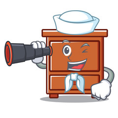 Wall Mural - Sailor with binocular wooden drawer mascot cartoon