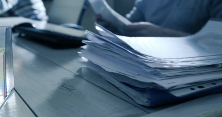 Working in office with documents and computer. Office background