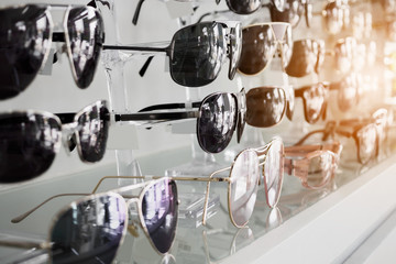 Canvas Print - sunglasses on shelves in glasses store