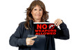 © Pamela Au - Middle Aged Woman holding a No Weapons Sign and a Handgun