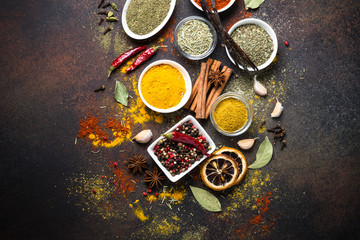 Wall Mural - Set of Various spices on dark stone table.