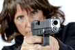 © Pamela Au - Mature Woman shooting a Handgun