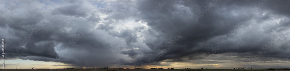 panorama view of cloudy gray rainy sky at sunset - obrazy, fototapety, plakaty 