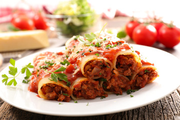 Wall Mural - canneloni with beef and tomato sauce