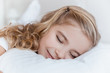 © LIGHTFIELD STUDIOS - adorable kid sleeping on pillow in bedroom