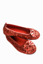 Pair Of Red Glittered Shoes On A White Background