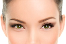 Asian Beauty Woman With Green Eyes Wearing Cat Eye Smokey Eyes Eyeliner Makeup And Mascara. Laser Treatment, Anti-aging Eyelid Plastic Surgery.