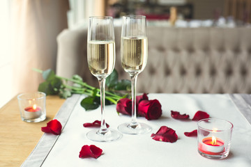 Dining table in restaurant isolated close-up champagne glasses