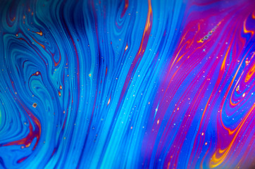 beautiful psychedelic abstraction formed by light on the surface of a soap bubble