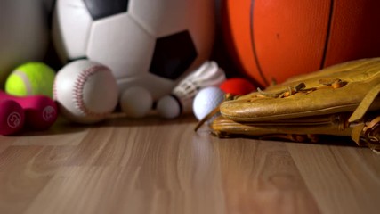 Wall Mural - Sports Equipment on wooden background