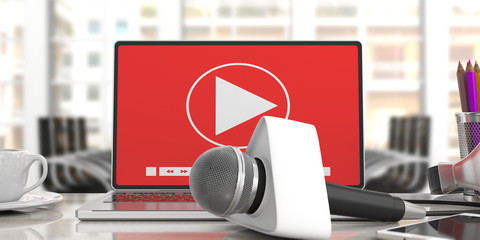 Microphone with blank box and a computer on blur office background. 3d illustration