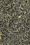 Fototapeta Zwierzęta - Tea herbs texture. Green tea background. Organic dried green tea leaves.