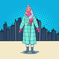 Wall Mural - Pop Art Beautiful Woman in Warm Winter Clothes in the City. Cold Weather. Vector illustration