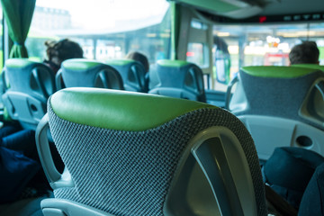 transport, tourism, road trip and equipment concept - travel bus interior and seats