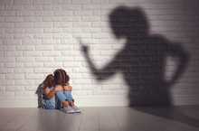 Domestic Violence. Angry Mother Scolds   Frightened Daughter .